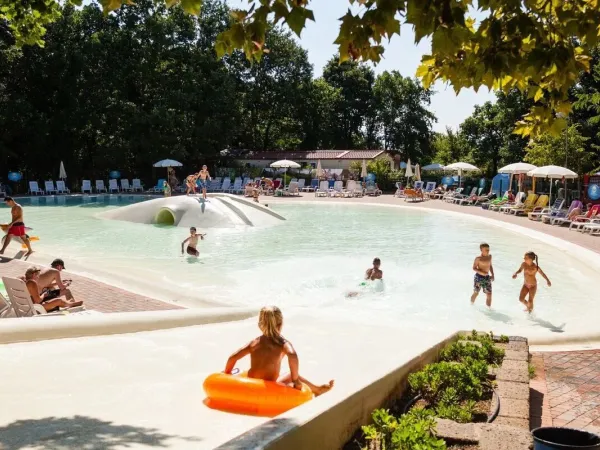 Swimming pool at Roan camping hu I Pini village.