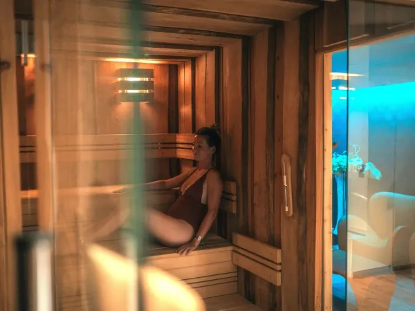 Lady in the sauna at Roan campsite Les Méditerranées Beach Garden.