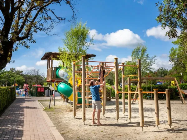 Playing in the playground at Roan camping hu Montescudaio village.