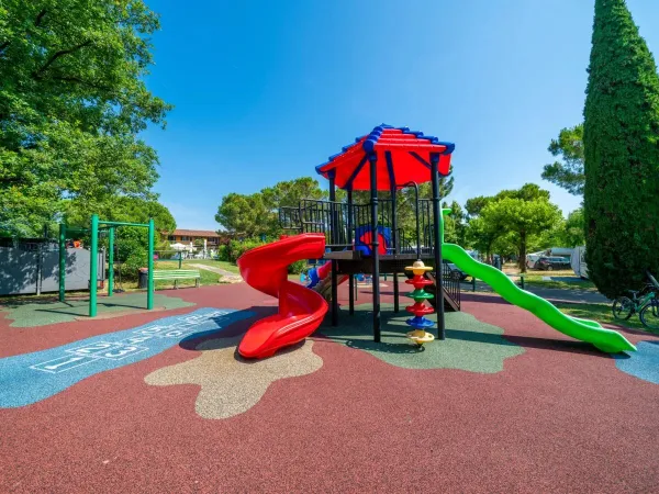 The playground at Roan camping La Rocca Manerba.