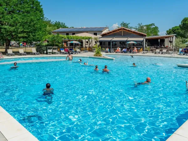 Swimming pool with slides at Roan camping La Grand Terre.