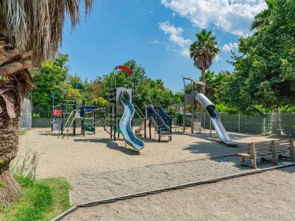 A playground at Roan camping La Sirène.