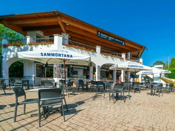 Poolside restaurant at Roan camping hu Norcenni Girasole village.