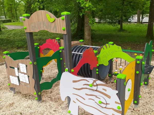 A playground at Roan camping Le Lac des Vieilles Forges.