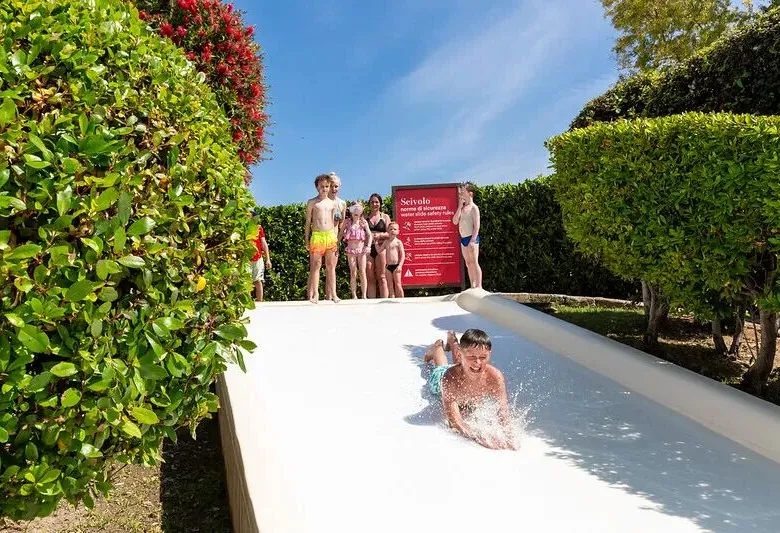 Sliding boy at Roan hu Fabulous village.