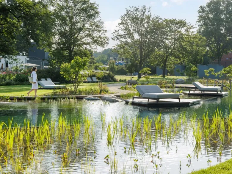A natural pond for swimming at Roan campsite De Twee Bruggen.