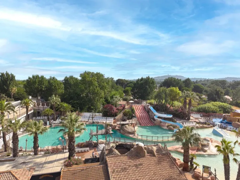 Overview of the swimming pool at Roan Camping Les Sables d'Or.