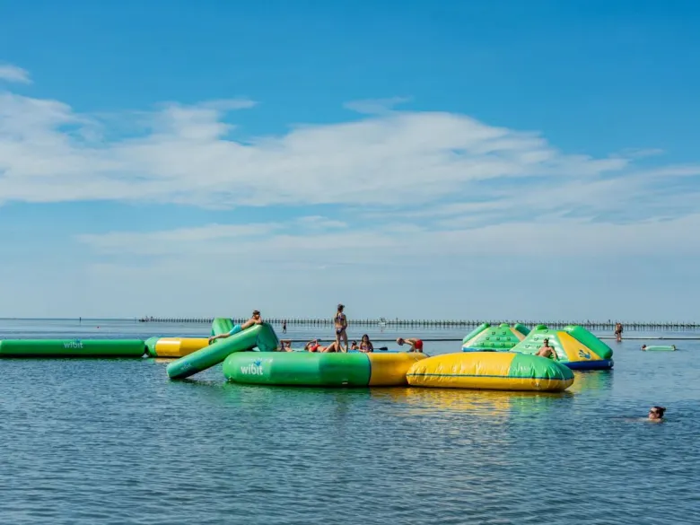 Inflatable cushions in the sea at Roan’s Villaggio Turistico Europa campsite.