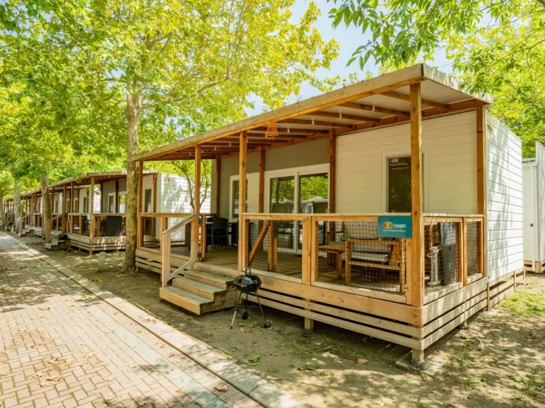 A cosy little row of mobile homes at Roan Campsite in Tahiti.