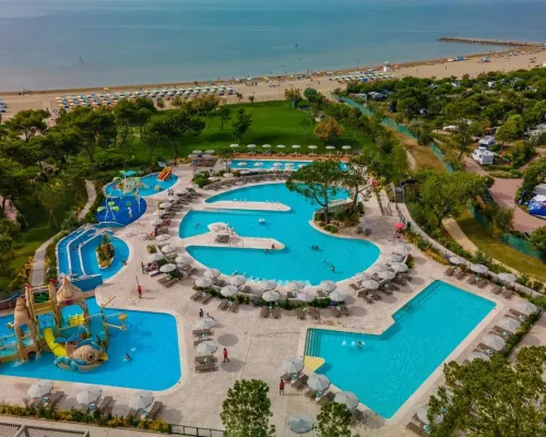 Aerial photo water park combined with the beach at Roan camping Mediterraneo.