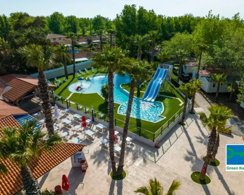 Swimming pool and terrace at Roan camping Les Sablines.