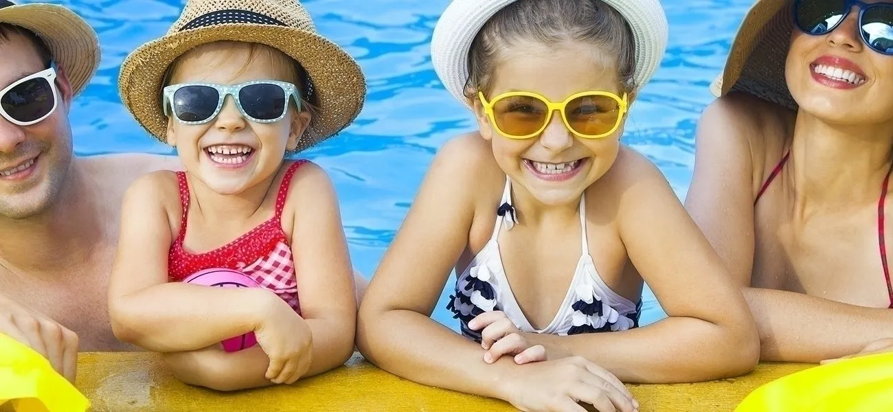 Family in pool at Ardeche campsite.