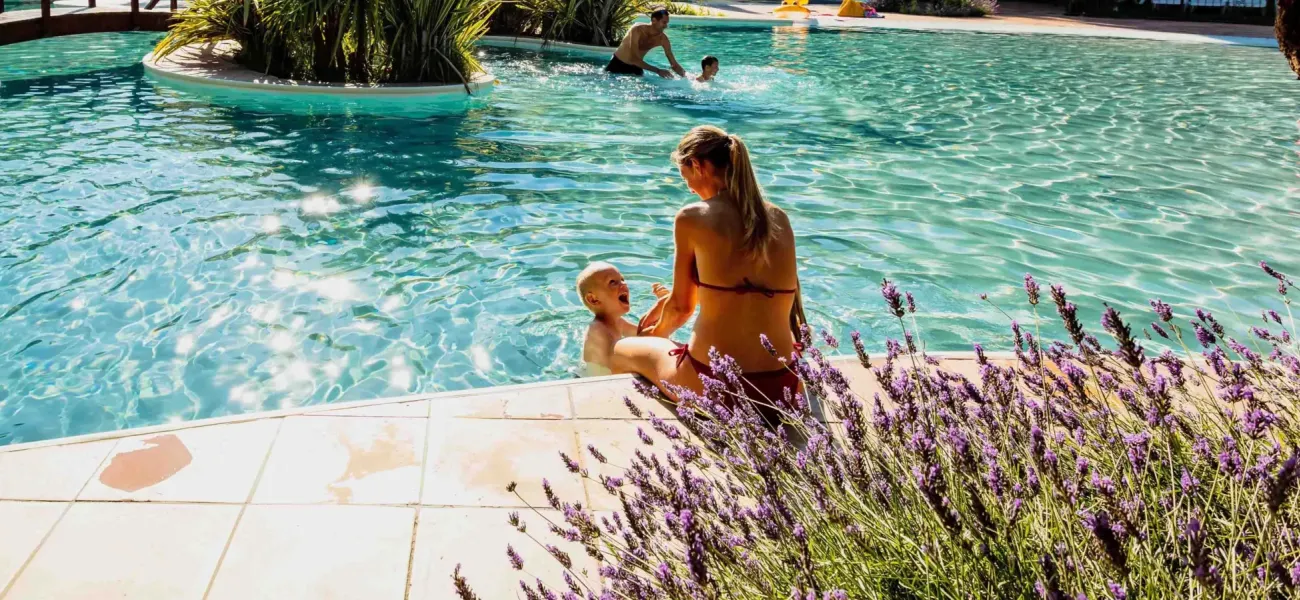 Mother and son in the pool at Roan camping Le Sérignan Plage.