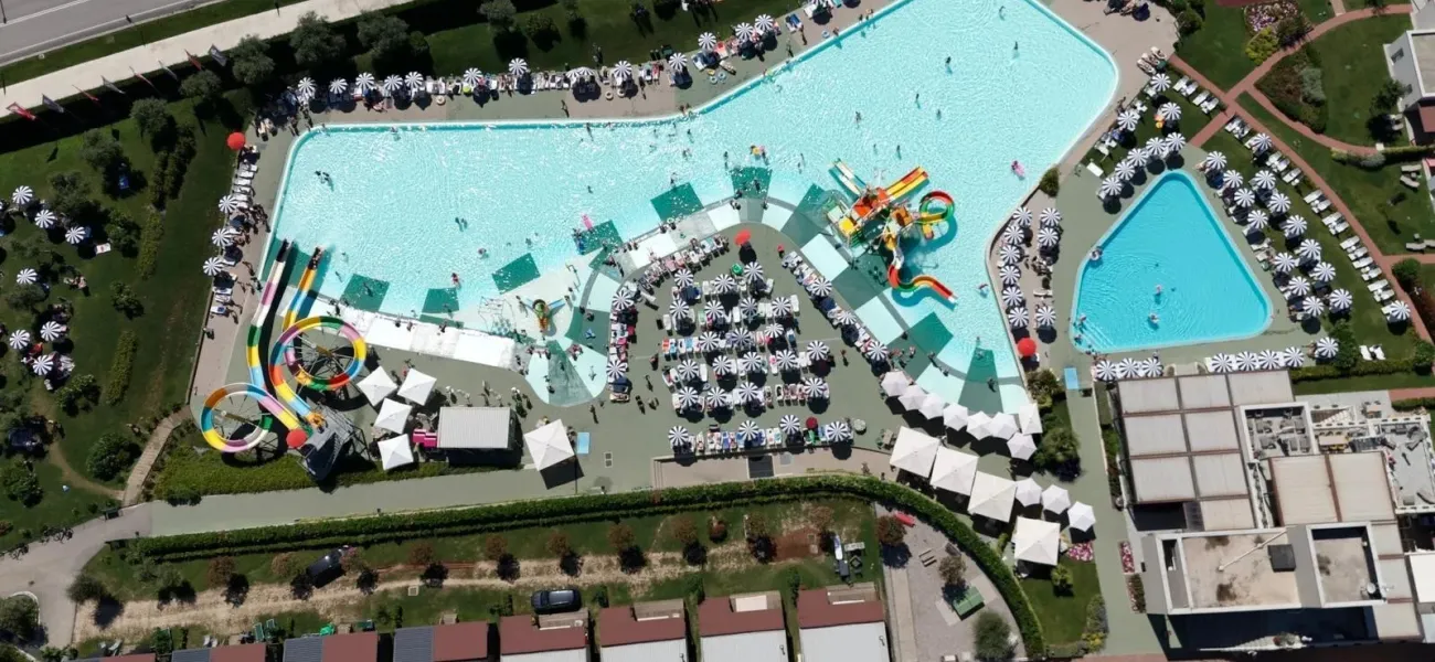 Drone photo of swimming pool complex campsite Cisano/ San Vito.