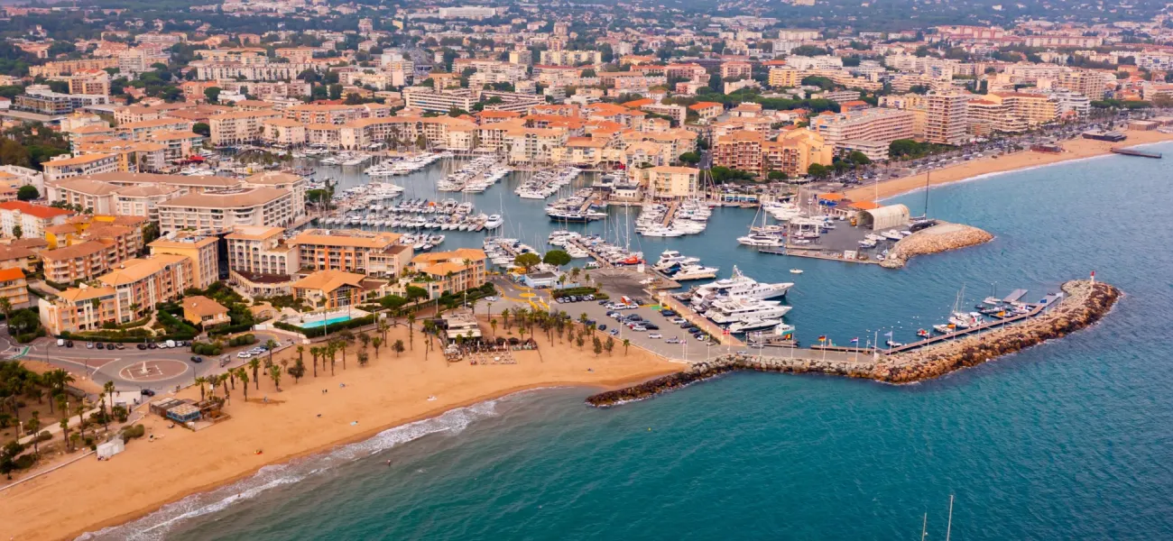 A panoramic view of the coastline and town of Fréjus.